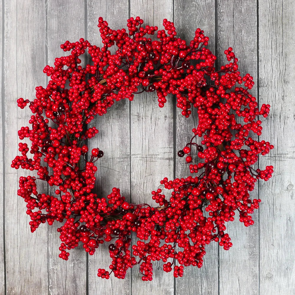 Χριστουγεννιάτικα στεφάνια με κόκκινους καρπούς